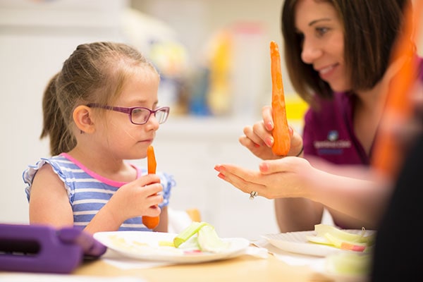 A child getting Feeding and Swallowing Problems (Dysphagia) treatment in Brampton, ON